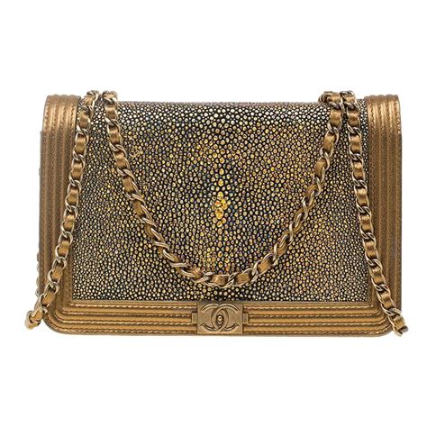 chanel gold stingray clutch|Chanel Stingray Degrade Frame Clutch Dark Gold.